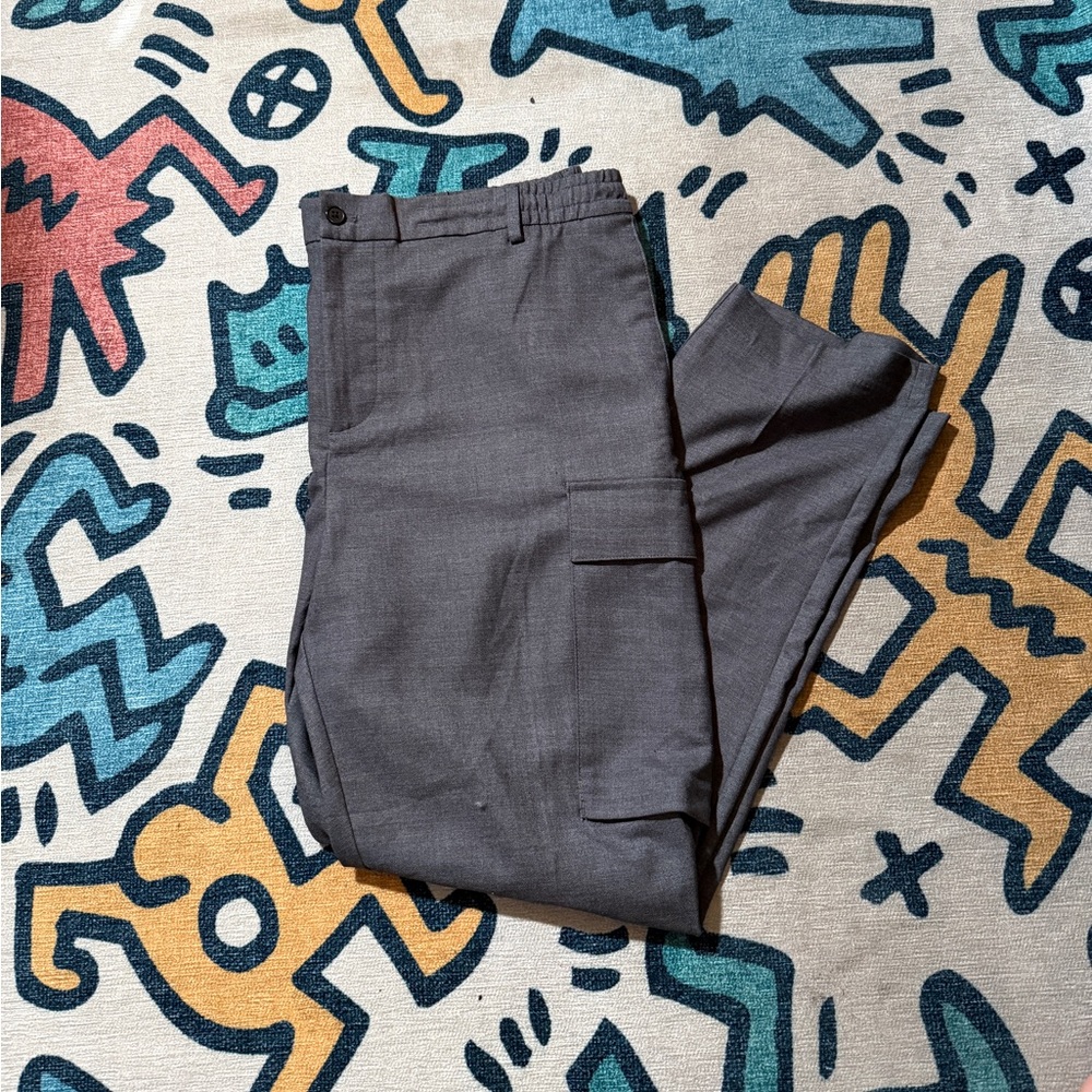 Grey H&M cargo trousers with adjustable waist, featuring multiple pockets